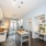 Kitchen with island and built-in nook with shelving