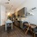 Kitchen with an island and small dining space.