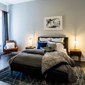 Large bedroom with a natural-light window