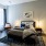 Large bedroom with a natural-light window