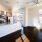 Kitchen with an island and wood-style flooring